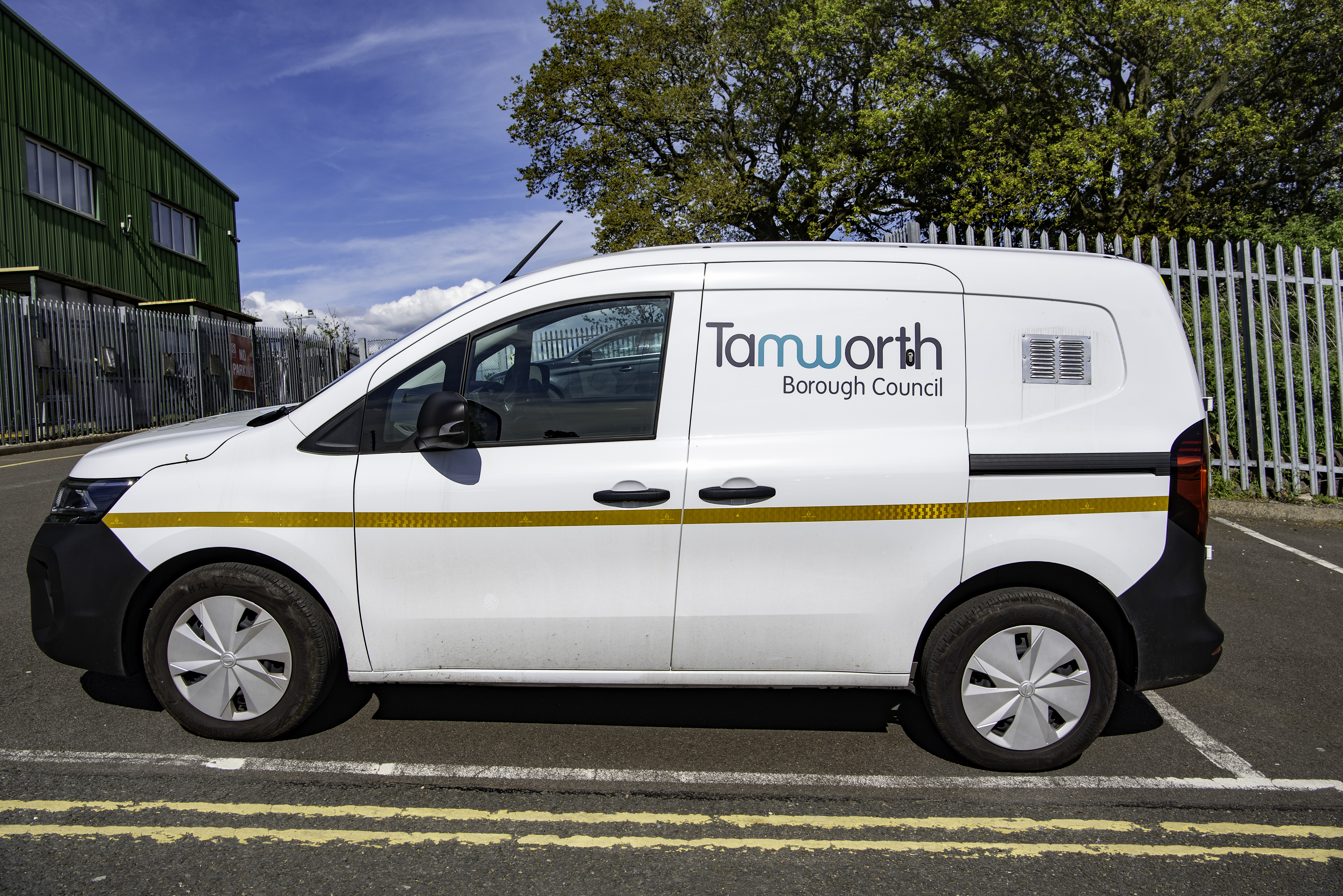 photo of a white electric van with Tamworth Borough Council written on the side